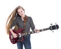 Blond teen girl and bass guitar against white background in stud Royalty Free Stock Photo