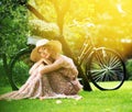 Blond retro woman on a meadow Royalty Free Stock Photo