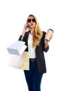 Blond shopaholic woman bags and smartphone