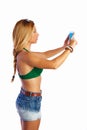 Blond short jeans woman selfie tablet photo Royalty Free Stock Photo