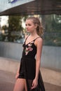 Blond Teen Girl Wearing Black Maxi Dress