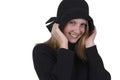 Blond teenage girl in black hat Royalty Free Stock Photo