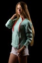 Blond teenager girl in fashion windbreaker