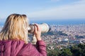 Blond woman admiring Barcelona from the top of Tibidabo Royalty Free Stock Photo