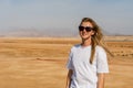Blond woman at desert of Ras Mohammed national park, Royalty Free Stock Photo