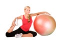 Blond woman exercising with a pilates ball Royalty Free Stock Photo