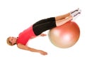 Blond woman exercising with a pilates ball Royalty Free Stock Photo