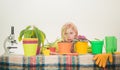 Blond woman with flower pot plant in hands studio isolated on white. Close up portrait. Young girl is cute smiling and Royalty Free Stock Photo