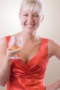 Blond woman with a glass of wine. #1 Royalty Free Stock Photo