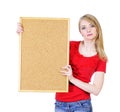 Blond woman holding a cork board Royalty Free Stock Photo