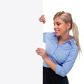 Blond woman holding the side of a blank sign board Royalty Free Stock Photo