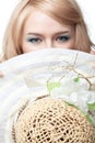 Blond woman looking behind hat Royalty Free Stock Photo