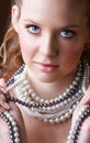 Blond woman in pearls Royalty Free Stock Photo