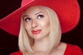 Blond woman with red lips wearing in hat, beautiful fashion girl Royalty Free Stock Photo