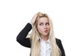 Blond woman scratching her head, isolated Royalty Free Stock Photo