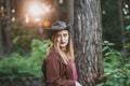 Blond woman wearing cowboy hat and brown shirt Royalty Free Stock Photo