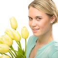 Blond woman with yellow tulips spring flowers Royalty Free Stock Photo
