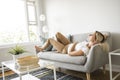 Blond women sleep on the sofa at home Royalty Free Stock Photo