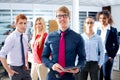 Blond young businessman multi ethnic teamwork