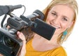 Blond young woman with professional video camcorder, on white Royalty Free Stock Photo