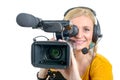 Blond young woman with professional video camcorder, on white Royalty Free Stock Photo