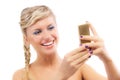 Blond young woman read sms on phone Royalty Free Stock Photo