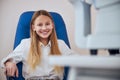 Blonde beautiful girl looking at the photo camera in medicine clinic Royalty Free Stock Photo