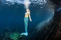 Blonde beautiful Mermaid diver underwater Royalty Free Stock Photo