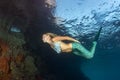 Blonde beautiful Mermaid diver underwater Royalty Free Stock Photo