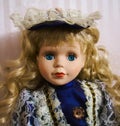 Blonde blue eyed doll Royalty Free Stock Photo