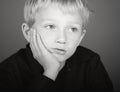 Blonde Boy Looking Depressed Royalty Free Stock Photo