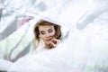 Blonde bride in fashion white wedding dress with makeup Royalty Free Stock Photo