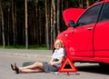 Blonde and broken car Royalty Free Stock Photo