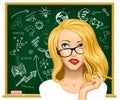 Blonde business woman in glasses near the blackboard Royalty Free Stock Photo