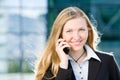 Blonde business woman on mobile phone Royalty Free Stock Photo