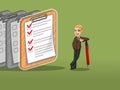 Blonde businessman in brown suit leaning a pen with completed checklists on paper Royalty Free Stock Photo