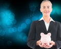 Blonde businesswoman holding piggy bank Royalty Free Stock Photo