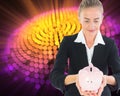 Blonde businesswoman holding piggy bank Royalty Free Stock Photo
