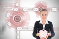 Blonde businesswoman holding pink piggy bank Royalty Free Stock Photo