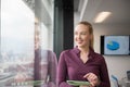 Blonde businesswoman working on tablet at office Royalty Free Stock Photo