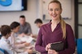 Blonde businesswoman working on tablet at office Royalty Free Stock Photo