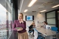 Blonde businesswoman working on tablet at office Royalty Free Stock Photo