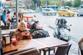 Blonde in a cafe drinking hot tea