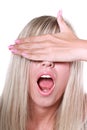 Blonde closing her eyes with a hand Royalty Free Stock Photo