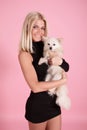 The blonde with the doggie Royalty Free Stock Photo