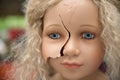 Blonde doll has a broken face, mannequin destroyed Royalty Free Stock Photo