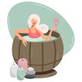The blonde is drinking wine in the jacuzzi. Woman in red swimsuit with champagne. Girl with a glass of wine in the sauna Royalty Free Stock Photo