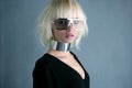 Blonde fashion futuristic silver glasses girl