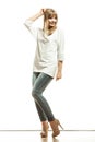 Blonde fashion woman in white shirt denim pants Royalty Free Stock Photo