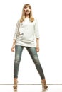 Blonde fashion woman in white shirt denim pants Royalty Free Stock Photo